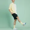 Converse kortärmad polotröja i krämgult med färgblock och krage för män