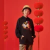 Hoodie med tryckta bokstäver i tecknad stil, asiatisk storlek ”Black White Red”