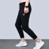 Joggingbyxor med logotryck i stickat, asiatiska storlekar ”Svart”